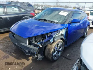 2013 Hyundai Veloster w/Black Int with VIN KMHTC6ADXDU170420, listed as a IAAI auction lot 41655443 with 157,800 mi miles and . Bid and sale history available at DreamBid. Image 2.