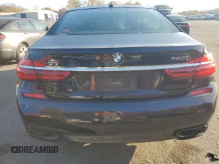 2018 BMW 7 Series 740i xDrive with VIN WBA7E4C53JGV23968, listed as a Copart auction lot 77244814 with 0 mi miles and Salvage Title. Bid and sale history available at carsss.com. Image 6.