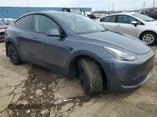 2023 Tesla Model Y Long Range z VIN 7SAYGDEE3PF884220, wystawiony jako Copart lot #52072605 z przebiegiem 44 996 mil mil oraz Czysty tytuł • Clean title. Historia ofert i sprzedaży dostępna na DreamBid. Obrazek 4.