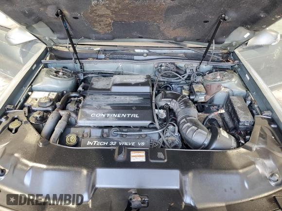 1997 Lincoln Continental with VIN 1LNLM97VXVY624609, listed as a Copart auction lot 73921634 with 119,746 mi miles and Salvage Title. Bid and sale history available at carsss.com. Image 11.