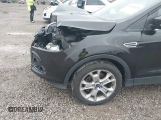 2013 Ford Escape SEL with VIN 1FMCU9H95DUC64995, listed as a IAAI auction lot 40821020 with 120,114 mi miles. Bid and sale history available at carsss.com. Image 6.