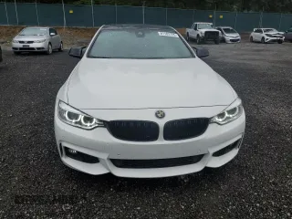 2017 BMW 4 Series 430i xDrive with VIN WBA4R9C39HK879013, listed as a Copart auction lot 61182725 with 102,448 mi miles and Salvage title. Bid and sale history available at DreamBid. Image 5.