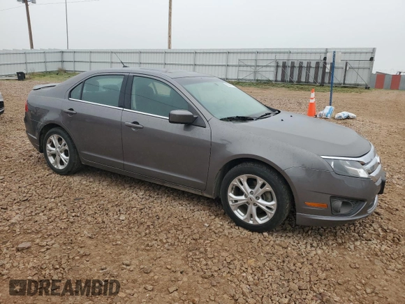 2012 Ford Fusion SE with VIN 3FAHP0HA7CR317179, listed as a Copart auction lot 60606575 with 148,766 mi miles and Clean title. Bid and sale history available at DreamBid. Image 4.