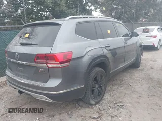 2019 Volkswagen Atlas SEL with VIN 1V2MR2CAXKC606820, listed as a IAAI auction lot 41174864 with 157,416 mi miles and . Bid and sale history available at DreamBid. Image 4.