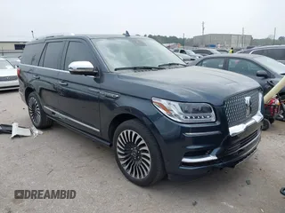 2021 Lincoln Navigator Black Label z VIN 5LMJJ2TT6MEL13834, wystawiony jako IAAI lot #41801640 z przebiegiem 59 843 mil mil oraz . Historia ofert i sprzedaży dostępna na DreamBid. Obrazek 1.