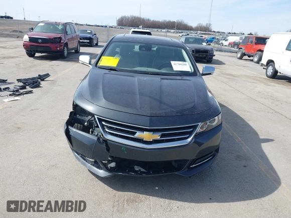 2015 Chevrolet Impala LTZ with VIN 1G1165S39FU138640, listed as a IAAI auction lot 41780288 with 145,000 mi miles and . Bid and sale history available at DreamBid. Image 13.