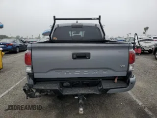 2021 Toyota Tacoma SR with VIN 3TMCZ5AN4MM402889, listed as a Copart auction lot 59942695 with 61,504 mi miles and Salvage title. Bid and sale history available at DreamBid. Image 6.