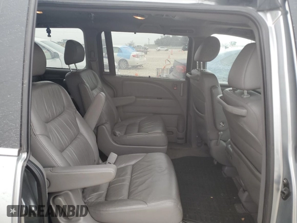 2010 Honda Odyssey EX-L z VIN 5FNRL3H79AB035026, wystawiony jako Copart lot #45910525 z przebiegiem 133 818 mil mil oraz Szkoda całkowita • Salvage title. Historia ofert i sprzedaży dostępna na DreamBid. Obrazek 11.