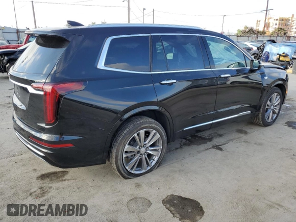2023 Cadillac XT6 FWD Premium Luxury with VIN 1GYKPCRS9PZ117215, listed as a Copart auction lot 71242714 with 29,162 mi miles and Salvage Title. Bid and sale history available at carsss.com. Image 3.