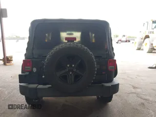 2015 Jeep Wrangler Sport with VIN 1C4AJWAG8FL550635, listed as a IAAI auction lot 42116285 with 111,782 mi miles. Bid and sale history available at carsss.com. Image 16.