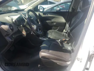 2014 Chevrolet Sonic LTZ with VIN 1G1JE5SB7E4202652, listed as a Copart auction lot 48540805 with 128,328 mi miles and Salvage Title. Bid and sale history available at carsss.com. Image 7.