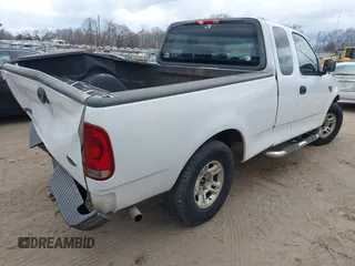 2003 Ford F-150 XL with VIN 1FTRX17W23NA71890, listed as a IAAI auction lot 41716266 with 1 mi miles. Bid and sale history available at carsss.com. Image 4.