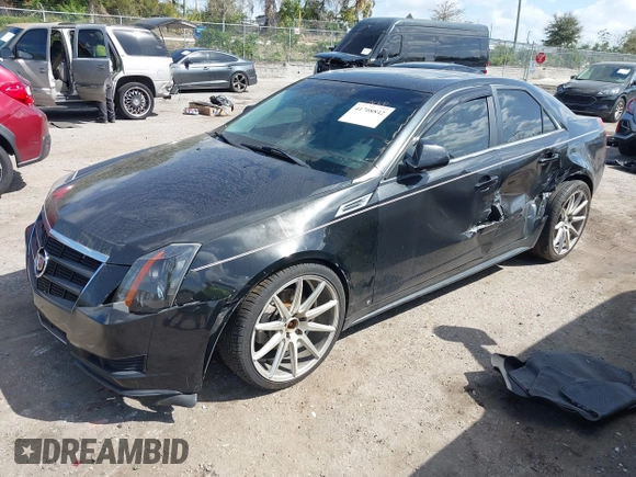 2011 Cadillac CTS Sedan Luxury with VIN 1G6DH5EY8B0116879, listed as a IAAI auction lot 41708842 with 124,550 mi miles. Bid and sale history available at carsss.com. Image 17.