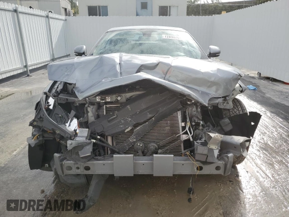 2010 Jaguar XK with VIN SAJWA4GB4ALB37114, listed as a Copart auction lot 77673824 with 99,999 mi miles and Salvage Title. Bid and sale history available at carsss.com. Image 5.