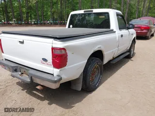 2003 Ford Ranger XL with VIN 1FTYR10D03TA39871, listed as a IAAI auction lot 42092257 with 282,924 mi miles. Bid and sale history available at carsss.com. Image 4.