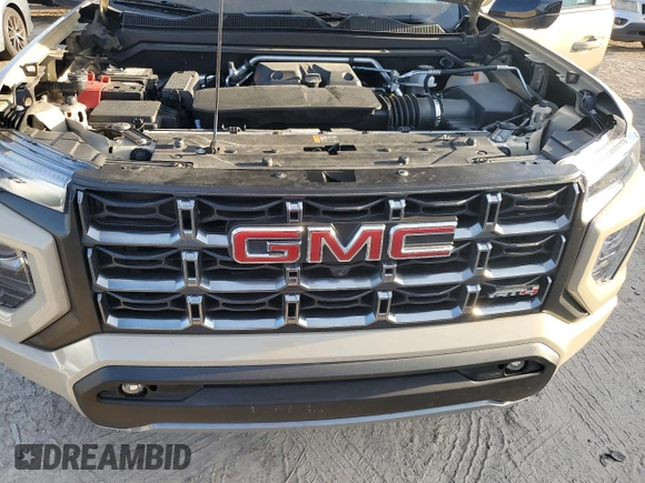 2023 GMC Canyon 4WD AT4 with VIN 1GTP6DEK3P1151112, listed as a Copart auction lot 77150454 with 5,573 mi miles and Non Repairable. Bid and sale history available at carsss.com. Image 11.