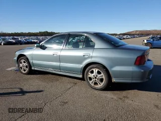 2000 Mitsubishi Galant LS with VIN 4A3AA56LXYE174881, listed as a Copart auction lot 79727154 with 106,001 mi miles and Salvage Title. Bid and sale history available at carsss.com. Image 2.