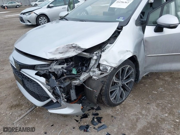 2019 Toyota Corolla Hatchback SE with VIN JTNK4RBE6K3064695, listed as a IAAI auction lot 41296362 with 56,282 mi miles. Bid and sale history available at carsss.com. Image 6.