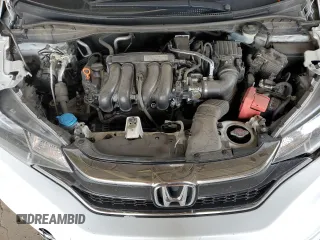 2019 Honda Fit LX z VIN 3HGGK5H48KM738241, wystawiony jako Copart lot #62702695 z przebiegiem 126 527 mil mil oraz Szkoda całkowita • Salvage title. Historia ofert i sprzedaży dostępna na DreamBid. Obrazek 11.