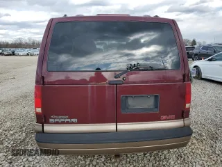 2002 GMC Safari with VIN 1GKDM19X42B513677, listed as a Copart auction lot 50717205 with Not Provided miles and Salvage Title. Bid and sale history available at carsss.com. Image 6.