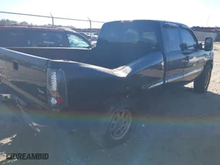 2002 GMC Sierra 1500 SLE with VIN 2GTEC19T321252686, listed as a IAAI auction lot 41355583 with 245,122 mi miles. Bid and sale history available at carsss.com. Image 4.