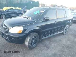 2003 Honda Pilot EX with VIN 2HKYF18423H506550, listed as a IAAI auction lot 41766510 with 999,999 mi miles. Bid and sale history available at carsss.com. Image 2.