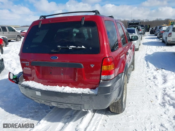 2005 Ford Escape XLT with VIN 1FMYU931X5KD99667, listed as a IAAI auction lot 41591057 with 69,595 mi miles. Bid and sale history available at carsss.com. Image 4.