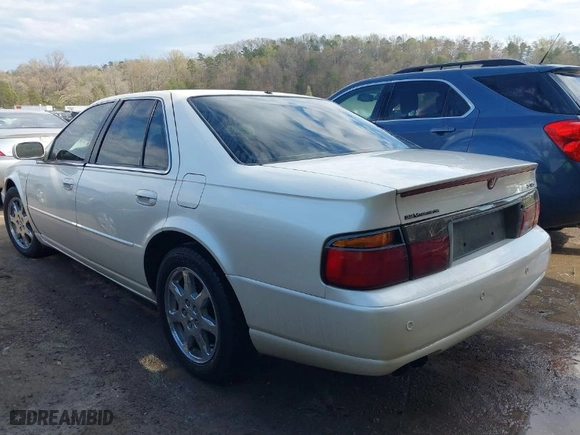 2003 Cadillac Seville Touring STS with VIN 1G6KY54903U133199, listed as a IAAI auction lot 41892181 with 132,423 mi miles. Bid and sale history available at carsss.com. Image 3.