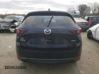2020 Mazda CX-5 Grand Touring with VIN JM3KFADM4L1783968, listed as a Copart auction lot 85994244 with 89,074 mi miles and Salvage Title. Bid and sale history available at DreamBid. Image 6.