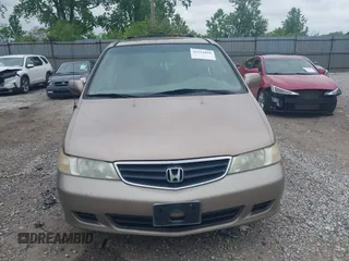 2003 Honda Odyssey EX-L z VIN 5FNRL18973B122173, wystawiony jako IAAI lot #42252018 z przebiegiem 204 487 mil mil oraz . Historia ofert i sprzedaży dostępna na DreamBid. Obrazek 13.