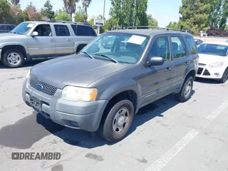 2004 Ford Escape XLS with VIN 1FMYU92194KA15054, listed as a IAAI auction lot 42772942 with 157,270 mi miles and . Bid and sale history available at DreamBid. Image 2.