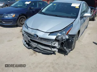 2021 Toyota Prius LE z VIN JTDL9MFU3M3028805, wystawiony jako IAAI lot #42043610 z przebiegiem 26 436 mil mil oraz . Historia ofert i sprzedaży dostępna na DreamBid. Obrazek 6.
