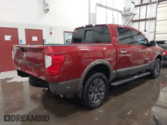 2017 Nissan Titan SV with VIN 1N6AA1E53HN529594, listed as a IAAI auction lot 41479406 with 121,715 mi miles and . Bid and sale history available at DreamBid. Image 4.