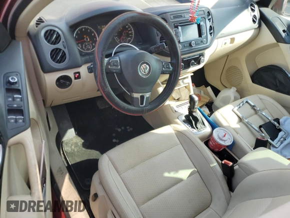 2012 Volkswagen Tiguan SE with VIN WVGAV7AX9CW003857, listed as a Copart auction lot 58356295 with 202,794 mi miles and Salvage title. Bid and sale history available at DreamBid. Image 8.
