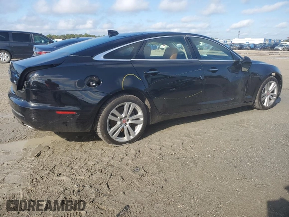2016 Jaguar XJ Portfolio with VIN SAJWJ2GDXG8W03143, listed as a Copart auction lot 86467114 with 42,923 mi miles and Salvage title. Bid and sale history available at DreamBid. Image 3.
