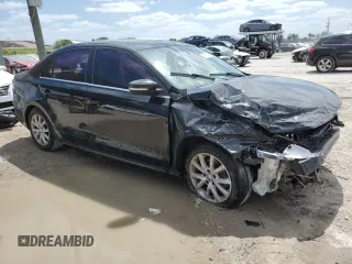 2014 Volkswagen Jetta SE with VIN 3VWD07AJ7EM293656, listed as a Copart auction lot 55077455 with 82,160 mi miles and Salvage title. Bid and sale history available at DreamBid. Image 4.