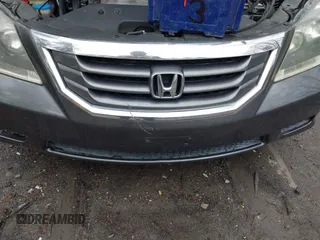 2010 Honda Odyssey EX-L with VIN 5FNRL3H75AB021480, listed as a IAAI auction lot 41793994 with 169,386 mi miles and . Bid and sale history available at DreamBid. Image 6.