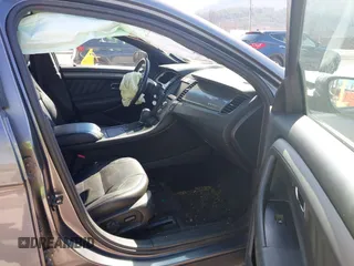 2014 Ford Taurus SEL with VIN 1FAHP2E82EG162676, listed as a IAAI auction lot 41795220 with 125,491 mi miles. Bid and sale history available at carsss.com. Image 5.