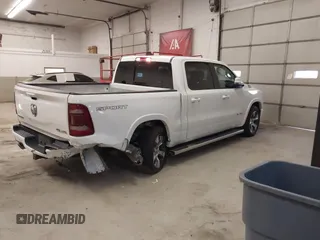 2021 Ram 1500 Laramie with VIN 1C6SRFJT6MN671456, listed as a IAAI auction lot 41087757 with 40,593 mi miles and . Bid and sale history available at DreamBid. Image 4.