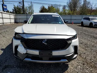 2024 Mazda CX-50 Premium Plus z VIN 7MMVABEY5RN243347, wystawiony jako Copart lot #53607655 z przebiegiem 3306 mil mil oraz Szkody całkowita. Historia ofert i sprzedaży dostępna na DreamBid. Obrazek 5.
