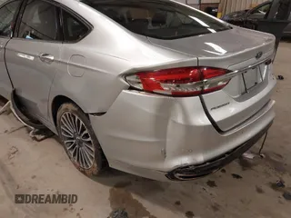 2017 Ford Fusion SE z VIN 3FA6P0H95HR203170, wystawiony jako IAAI lot #41569303 z przebiegiem 143 287 mil mil oraz . Historia ofert i sprzedaży dostępna na DreamBid. Obrazek 12.