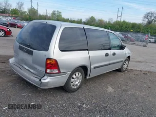 2003 Ford Windstar with VIN 2FMZA50463BB64937, listed as a IAAI auction lot 42083205 with 141,212 mi miles and . Bid and sale history available at DreamBid. Image 4.