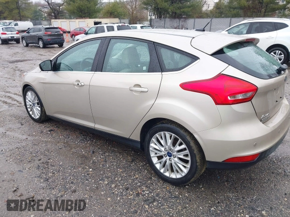 2017 Ford Focus Titanium with VIN 1FADP3N26HL207100, listed as a IAAI auction lot 41865961 with 220,850 mi miles and . Bid and sale history available at carsss.com. Image 3.