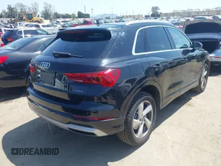 2019 Audi Q3 Premium with VIN WA1AECF33K1086047, listed as a IAAI auction lot 41905218 with 51,802 mi miles. Bid and sale history available at carsss.com. Image 4.