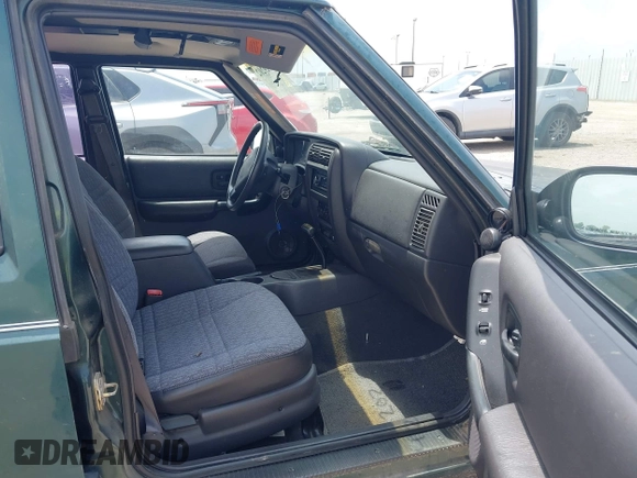 1999 Jeep Cherokee SE with VIN 1J4FT28S2XL669523, listed as a IAAI auction lot 42429202 with 83,250 mi miles and . Bid and sale history available at DreamBid. Image 5.