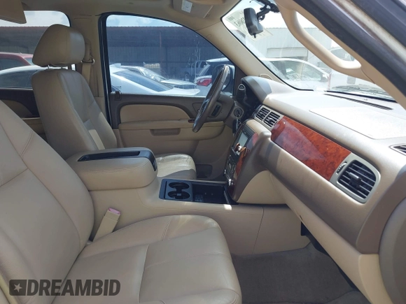 2013 Chevrolet Suburban LT with VIN 1GNSCJE08DR102735, listed as a IAAI auction lot 42228063 with 101,671 mi miles and . Bid and sale history available at DreamBid. Image 5.
