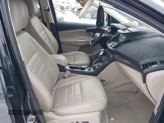 2016 Ford Escape Titanium with VIN 1FMCU9J96GUC08563, listed as a IAAI auction lot 41252475 with 120,404 mi miles. Bid and sale history available at carsss.com. Image 5.