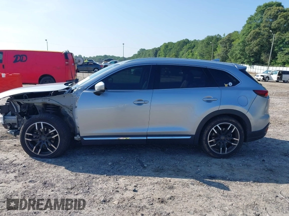 2016 Mazda CX-9 Signature with VIN JM3TCBEY7G0120023, listed as a IAAI auction lot 42431039 with 160,276 mi miles and . Bid and sale history available at DreamBid. Image 14.