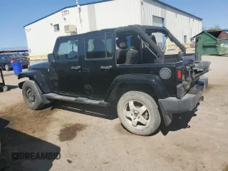 2014 Jeep Wrangler Unlimited Sahara with VIN 1C4BJWEGXEL150119, listed as a Copart auction lot 52378075 with 122,443 mi miles and Salvage Title. Bid and sale history available at carsss.com. Image 2.