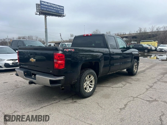 2014 Chevrolet Silverado 1500 LT with VIN 1GCVKREH1EZ169899, listed as a IAAI auction lot 42143501 with 124,789 mi miles and . Bid and sale history available at DreamBid. Image 4.